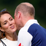 prince william was filmed secretly kissing kate middleton's hand.